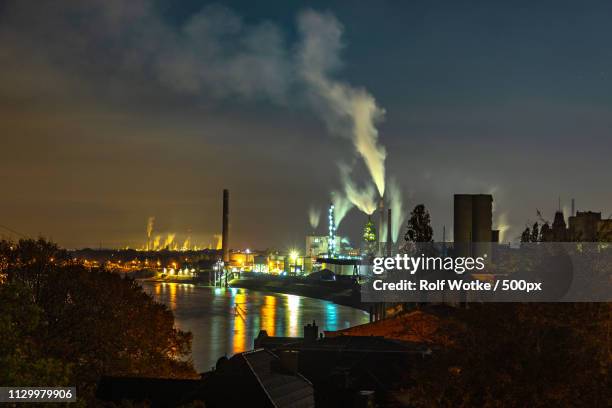 duisburg bei nacht - duisburg hafen stock pictures, royalty-free photos & images