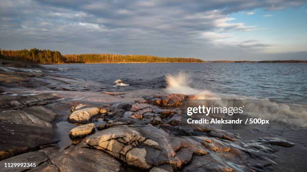 water meets granite - lake ladoga stock pictures, royalty-free photos & images