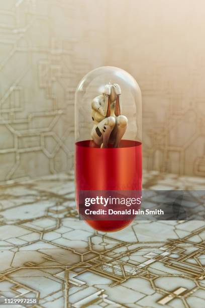 female cyborg inside drug capsule - love pills photos et images de collection