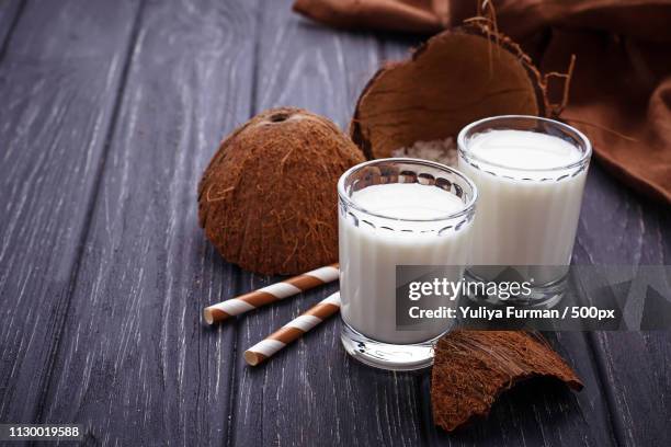 glasses of coconut milk - coconut shaving stock pictures, royalty-free photos & images