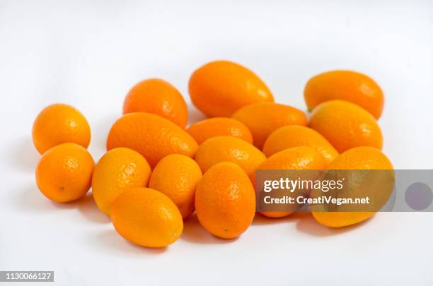 fresh kumquats - vegana stock pictures, royalty-free photos & images