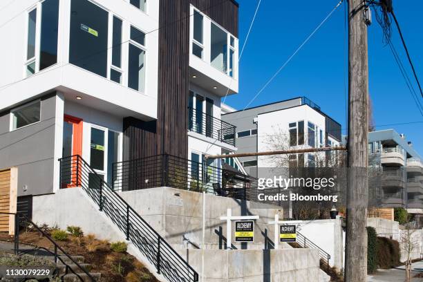 Townhouses for sale stand in the Queen Anne neighborhood of Seattle, Washington, U.S., on Sunday, March 10, 2019. For the first time in years, the...