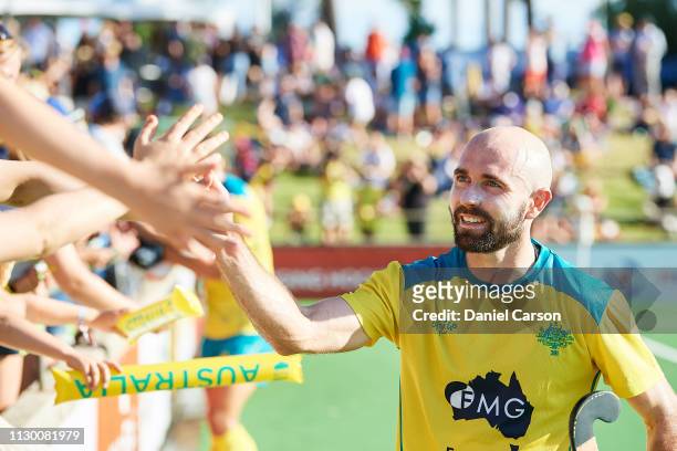 Matthew Swann of the Kookaburras celebrates with the fans after the win during the Men's FIH Field Hockey Pro League match between Australia and...