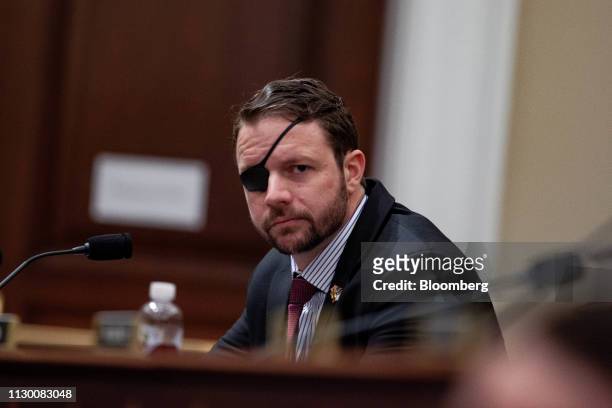 Representative Dan Crenshaw a Republican from Texas, listens during a House Budget Committee hearing with Russell Vought, acting director of the...