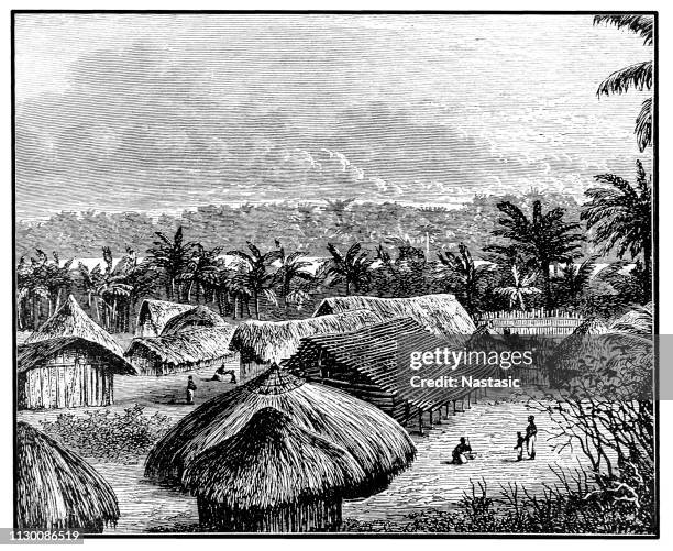 view of an african village - african village stock illustrations