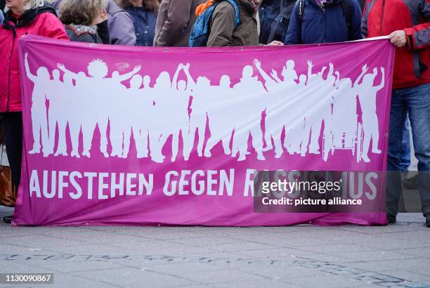 January 2019, Rhineland-Palatinate, Worms: Participants of a demonstration of the "Bündnis gegen Naziaufmärsche Worms" hold a banner with the...