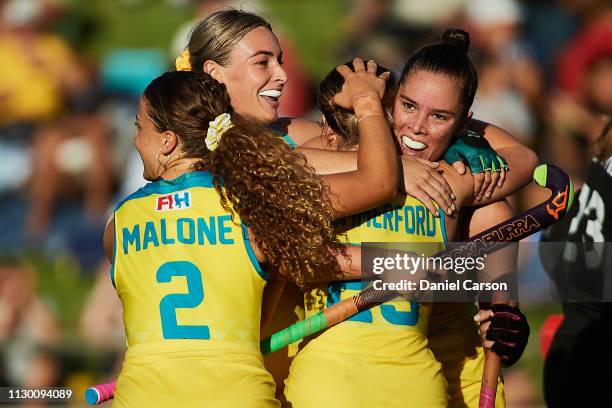 The Hockeyroos celebrate a goal by Kalindi Commerford during the Women's FIH Field Hockey Pro League match between Australia and Great Britain on...