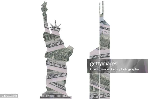 100 dollar us in creative concept in liberty statue and china bank - 100 dollar bill new stock-fotos und bilder