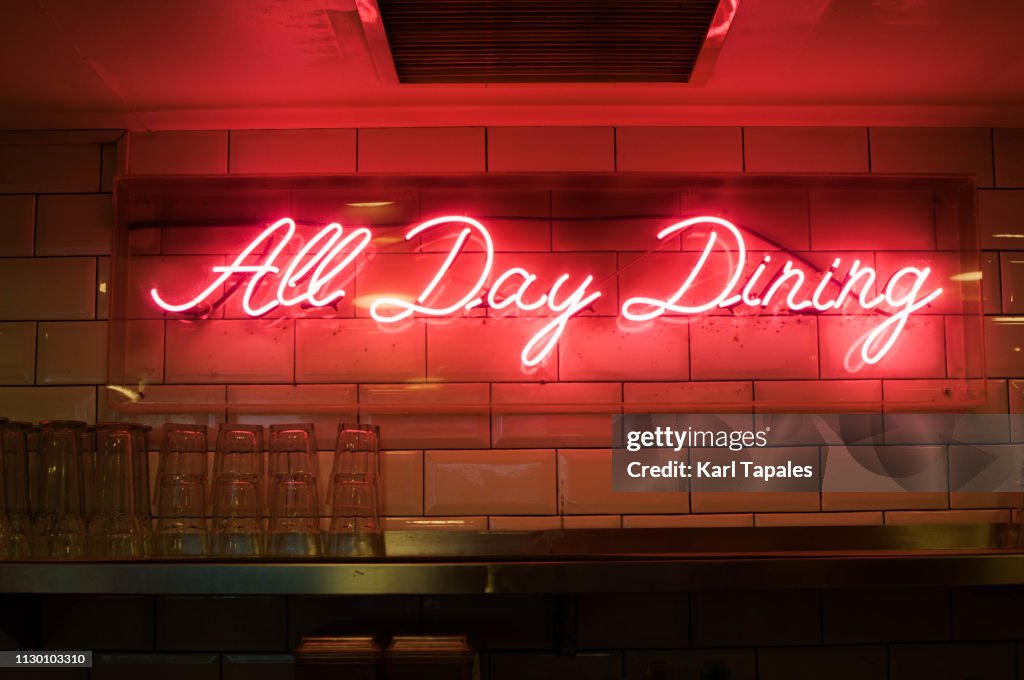 Neon light with a short phrase "all day dining"