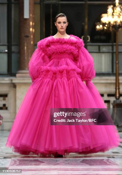 Model walks the runway at the Molly Goddard show during London Fashion Week February 2019 at the Durbar Court, Foreign and Commonwealth Office on...