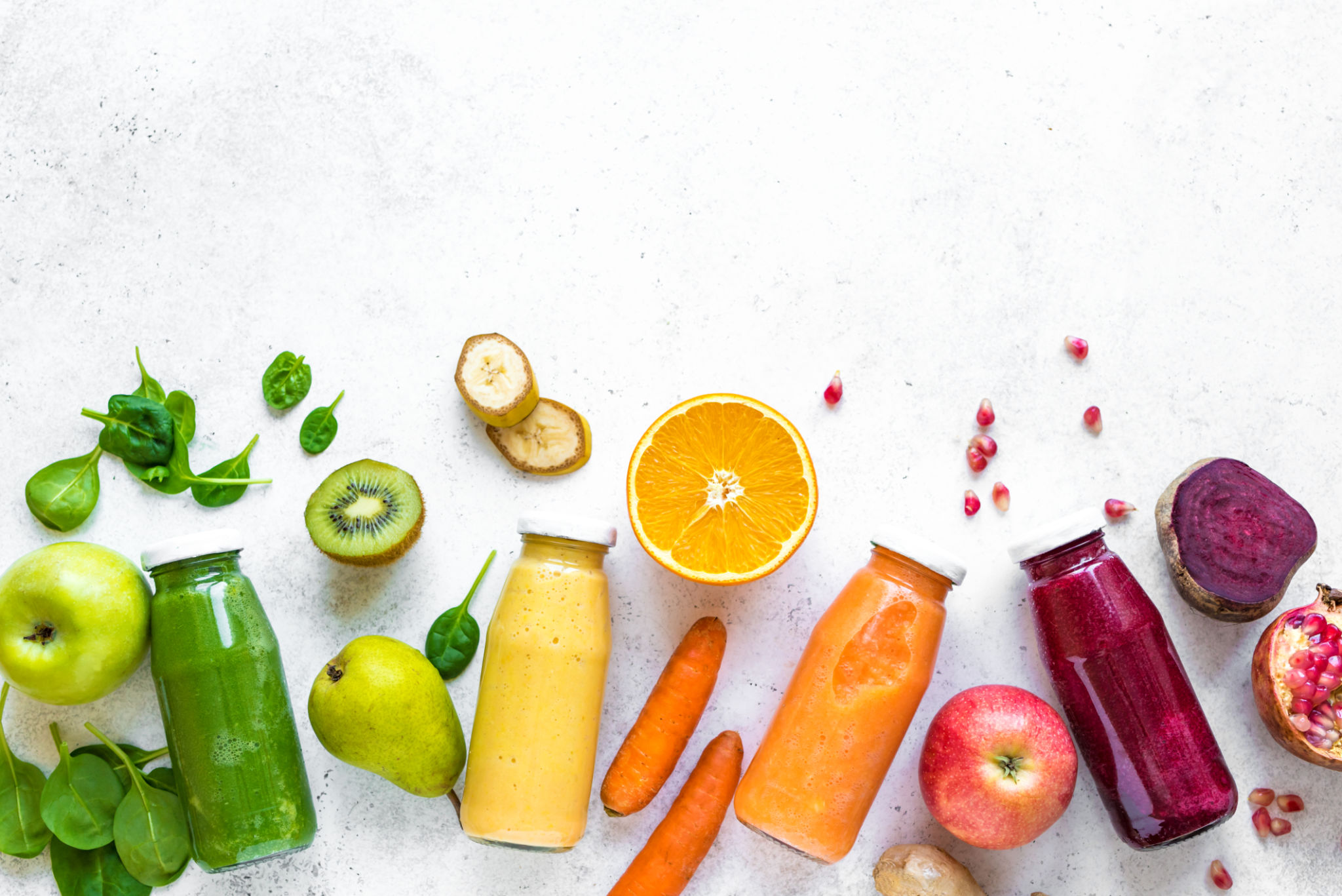 Various smoothies bottles and ingredients Various smoothies bottles and ingredients