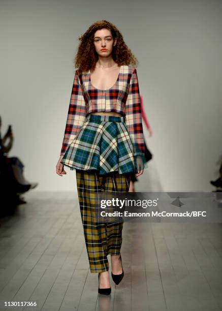 Model walks the runway at the Marta Jakubowski catwalk show during London Fashion Week Festival at the BFC Show Space on February 16, 2019 in London,...