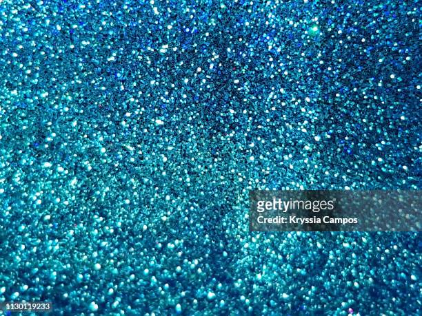 glitter texture in turquoise color - glitter stock pictures, royalty-free photos & images