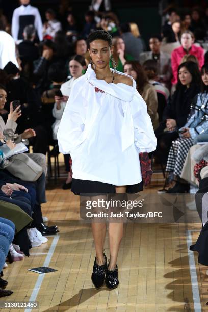 Model walks the runway at the TOGA show during London Fashion Week February 2019 on at the Seymour Leisure Centre on February 16, 2019 in London,...
