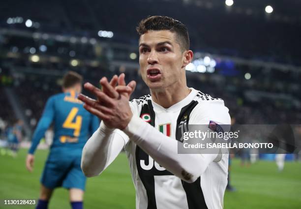Juventus' Portuguese forward Cristiano Ronaldo reacts during the UEFA Champions League round of 16 second-leg football match Juventus vs Atletico...