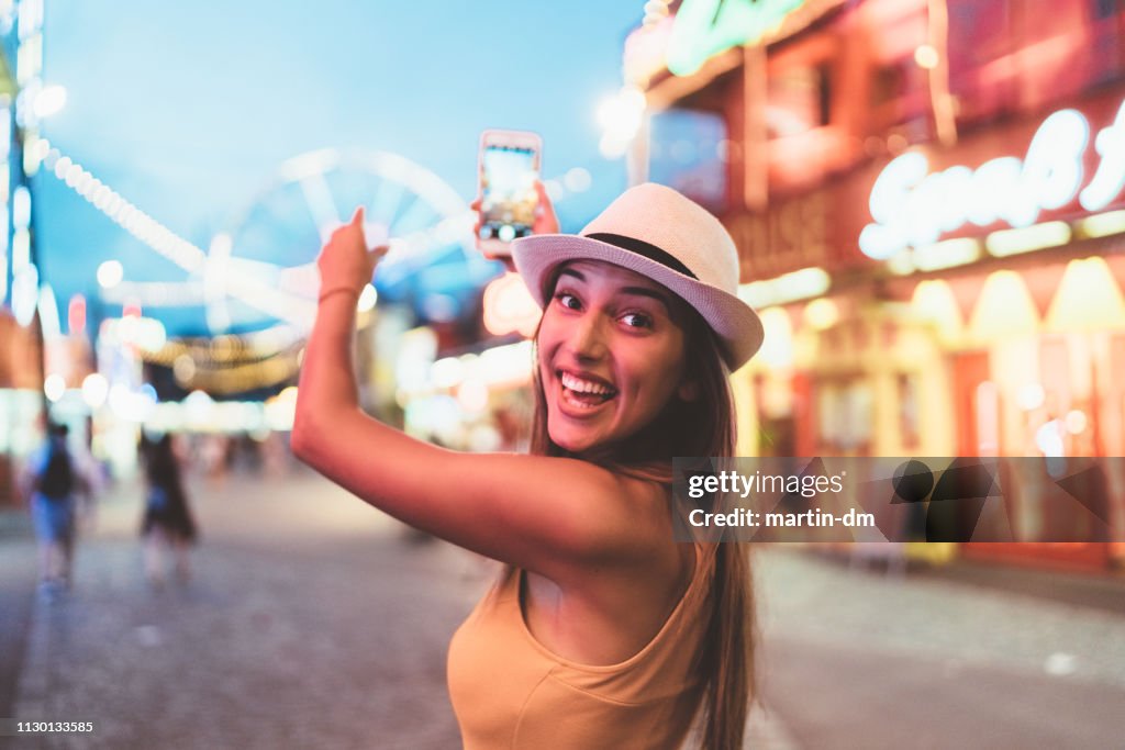 Happy girl at the amusement park