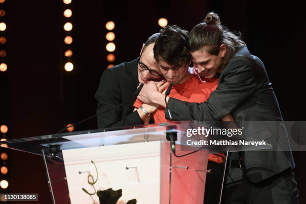 Mehmet Akif Büyükatalay , Bastian Klügel and Claus Reichel winner of the GWFF First Feature Award for "Oray" are seen at stage at the closing...