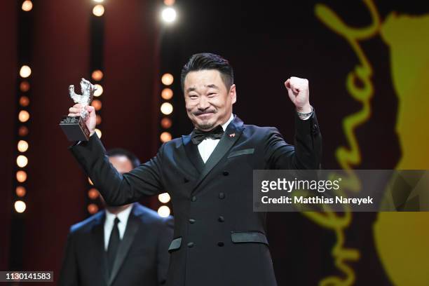 Wang Jingchun, winner of the Silver Bear for Best Actor for "So long, My Son" is s on stage at the closing ceremony of the 69th Berlinale...