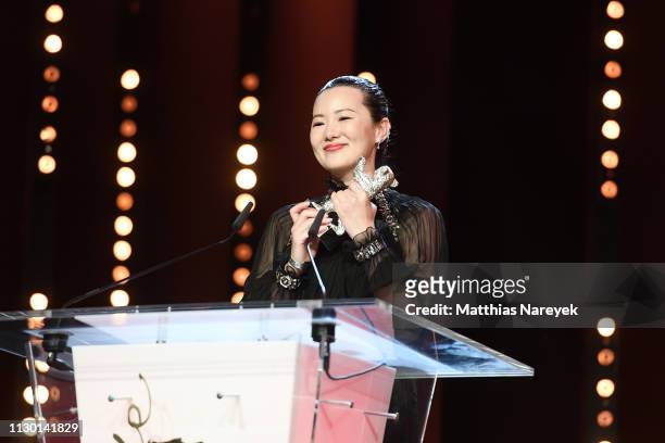 Yong Mei, winner of Silver Bear for Best Actress for "So long, My Son" is seen on stage at the closing ceremony of the 69th Berlinale International...