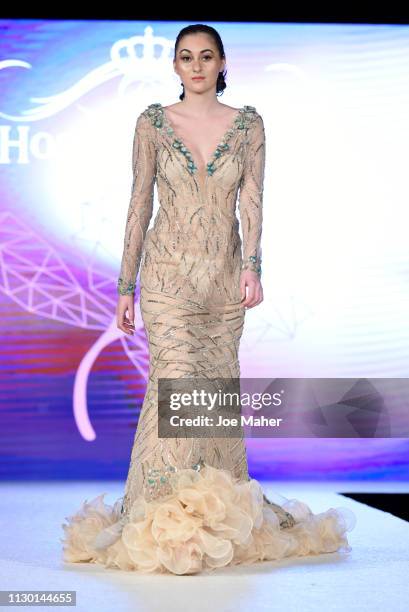 Models walk the runway for Aarti Mahtani at the House of iKons show during London Fashion Week February 2019 at the Millennium Gloucester London...