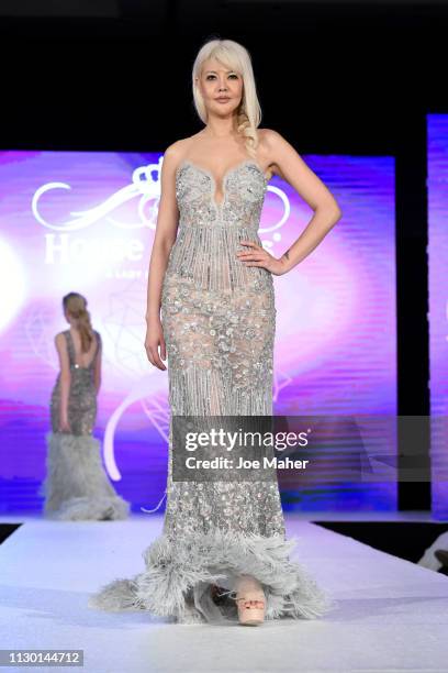 Models walk the runway for Aarti Mahtani at the House of iKons show during London Fashion Week February 2019 at the Millennium Gloucester London...