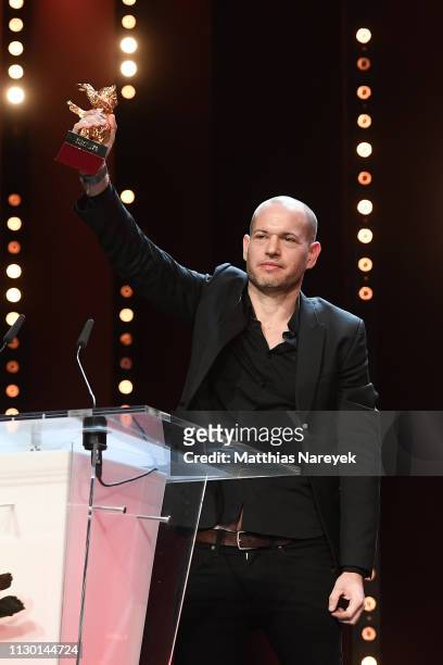 Nadav Lapid, winner of the Golden Bear for Best Film for "Synonymes", is seen on stage at the closing ceremony of the 69th Berlinale International...