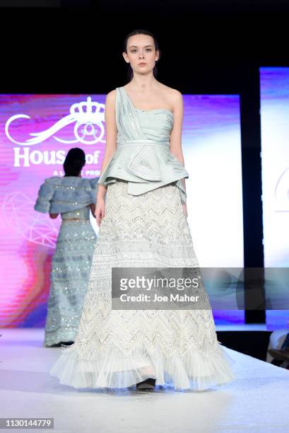 Models walk the runway for Aarti Mahtani at the House of iKons show during London Fashion Week February 2019 at the Millennium Gloucester London...