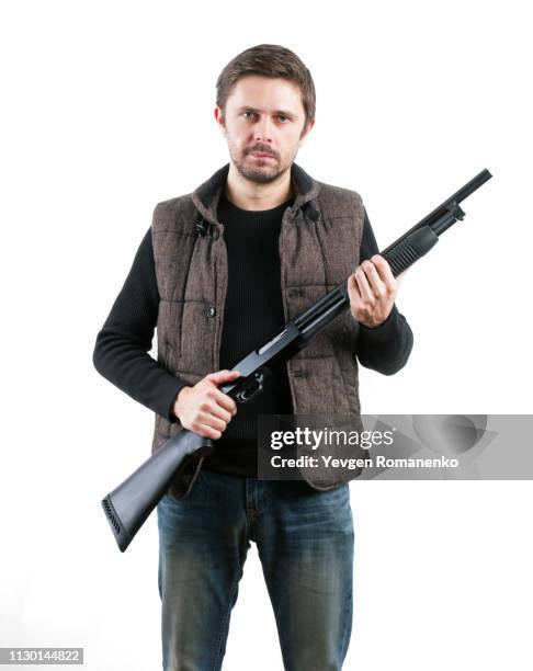 brutal man with shotgun on white background - armed robbery stock pictures, royalty-free photos & images