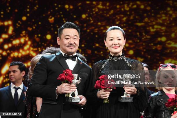 Wang Jingchun, winner of the Silver Bear for Best Actor for "So long, My Son", and Yong Mei, winner of Silver Bear for Best Actress for "So long, My...