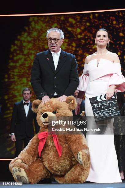 Festival director Dieter Kosslick and President of the International Jury Juliette Binoche are seen on stage at the closing ceremony of the 69th...