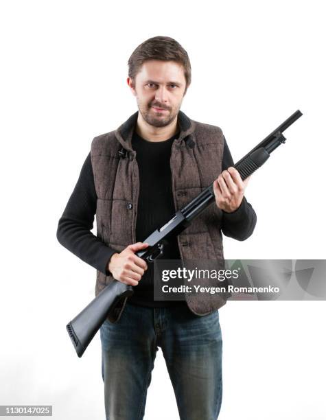 brutal man with shotgun on white background - pistol stock pictures, royalty-free photos & images