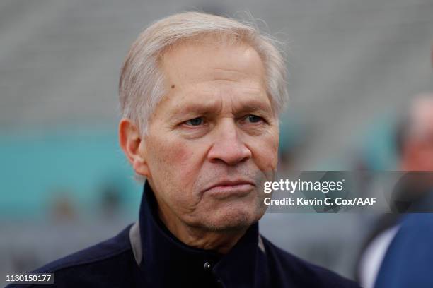 Analyst Chris Mortensen watches action prior to an Alliance of American Football game between the Birmingham Iron and the Salt Lake Stallions at...