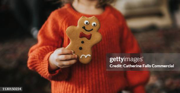 gingerbread men - gingerbread men stock pictures, royalty-free photos & images