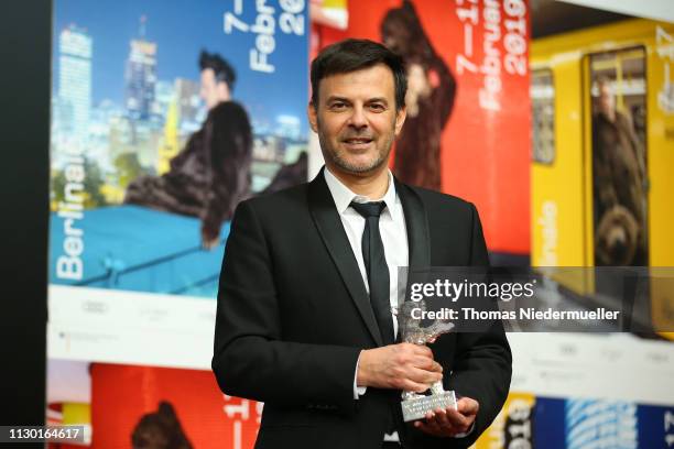 Francois Ozon, winner of the Silver Bear Grand Jury Prize for "By the Grace of God", attends the award winners press conference during the 69th...