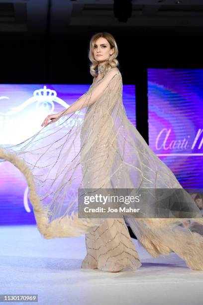 Models walk the runway for Aarti Mahtani at the House of iKons show during London Fashion Week February 2019 at the Millennium Gloucester London...