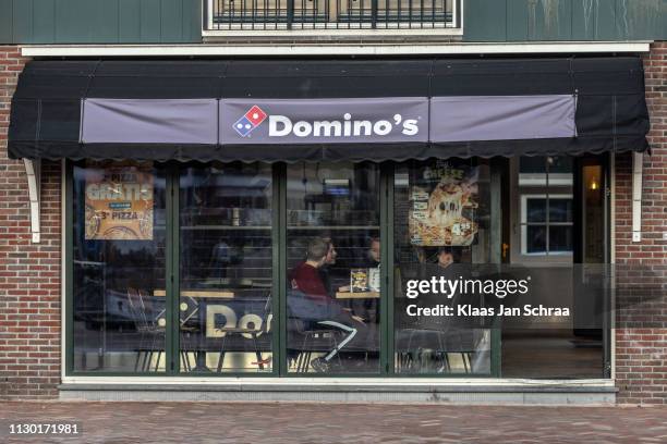 在荷蘭的 volendam, ingan van domino ' s pizza ' s - ingang 個照片及圖片檔