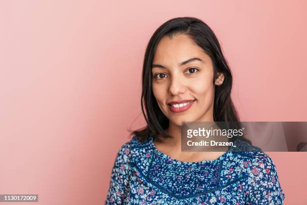 portrait of beautiful smiling mexican millennial woman - 30 34 years stock pictures, royalty-free photos & images