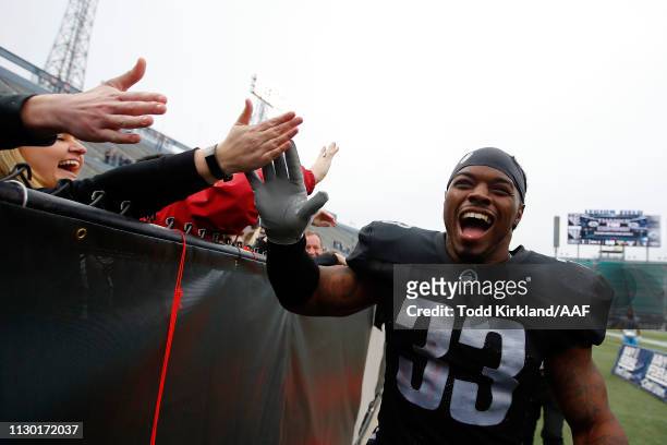 Trent Richardson of the Birmingham Iron greets fans following an Alliance of American Football game at Legion Field against the Salt Lake Stallions...