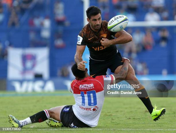 Jeronimo De La Fuente of Jaguares is tackled by Elton Jantjies of Lions during the Super Rugby Rd 1 match between Jaguares and Lions at Jose...