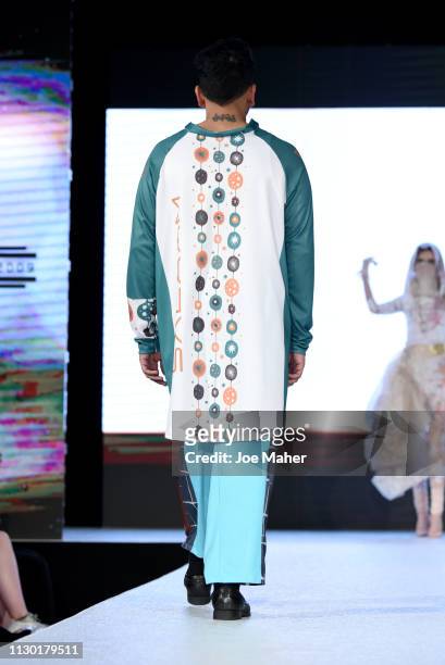 Models walk the runway for American Umma at the House of iKons show during London Fashion Week February 2019 at the Millennium Gloucester London...