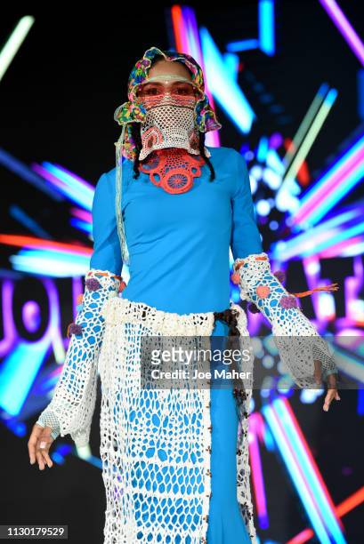 Models walk the runway for American Umma at the House of iKons show during London Fashion Week February 2019 at the Millennium Gloucester London...
