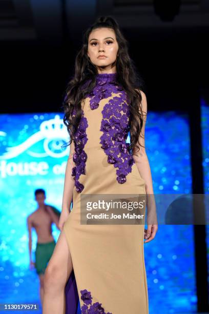 Models walk the runway for MEM Clothing Milano at the House of iKons show during London Fashion Week February 2019 at the Millennium Gloucester...