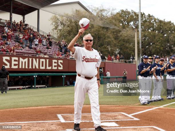 Coach Mike Martin of the Florida State Seminoles wave to the fans before the game against the Maine Black Bears at Dick Howser Stadium on the campus...