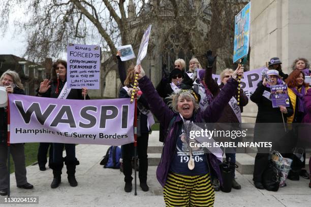 Women against state pension inequality protest outside the Houses of Parliament in central London on March 13 as Britain's Chancellor of the...
