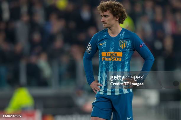 Antoine Griezmann of Club de Atletico Madrid looks dejected during the UEFA Champions League Round of 16 Second Leg match between Juventus and Club...