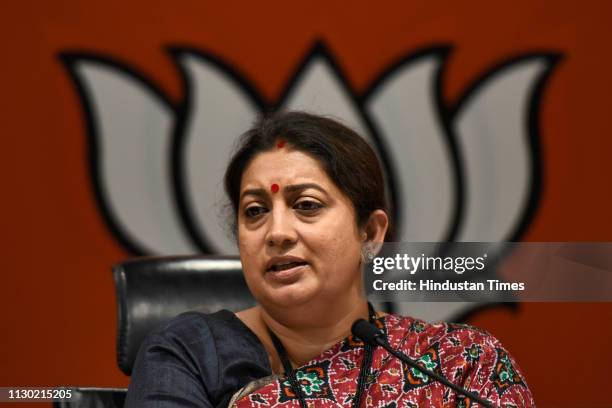 Union Textiles Minister Smriti Irani addresses a press conference at BJP headquarters, at Deen Dayal Upadhyay Marg, on March 13, 2019 in New Delhi,...