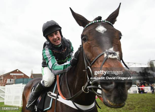 Cheltenham , United Kingdom - 13 March 2019; Nico de Boinville celebrates on Altior after winning the Betway Queen Mother Champion Chase on Day Two...