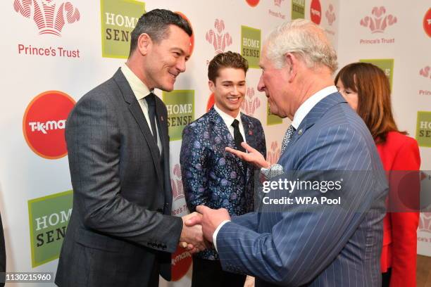 Prince Charles, Prince of Wales meets Luke Evans at the annual Prince's Trust Awards at the London Palladium on March 13, 2019 in London, England.