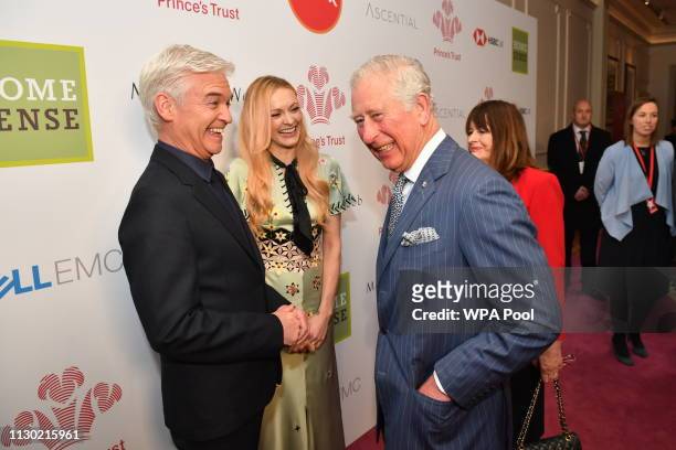 Prince Charles, Prince of Wales meets Phillip Schofield at the annual Prince's Trust Awards at the London Palladium on March 13, 2019 in London,...