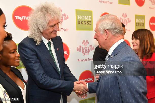 Prince Charles, Prince of Wales meets Brian May at the annual Prince's Trust Awards at the London Palladium on March 13, 2019 in London, England.